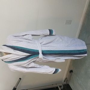 100% cotton,very heavy gray terry robe with teal and navy accent stripes.
